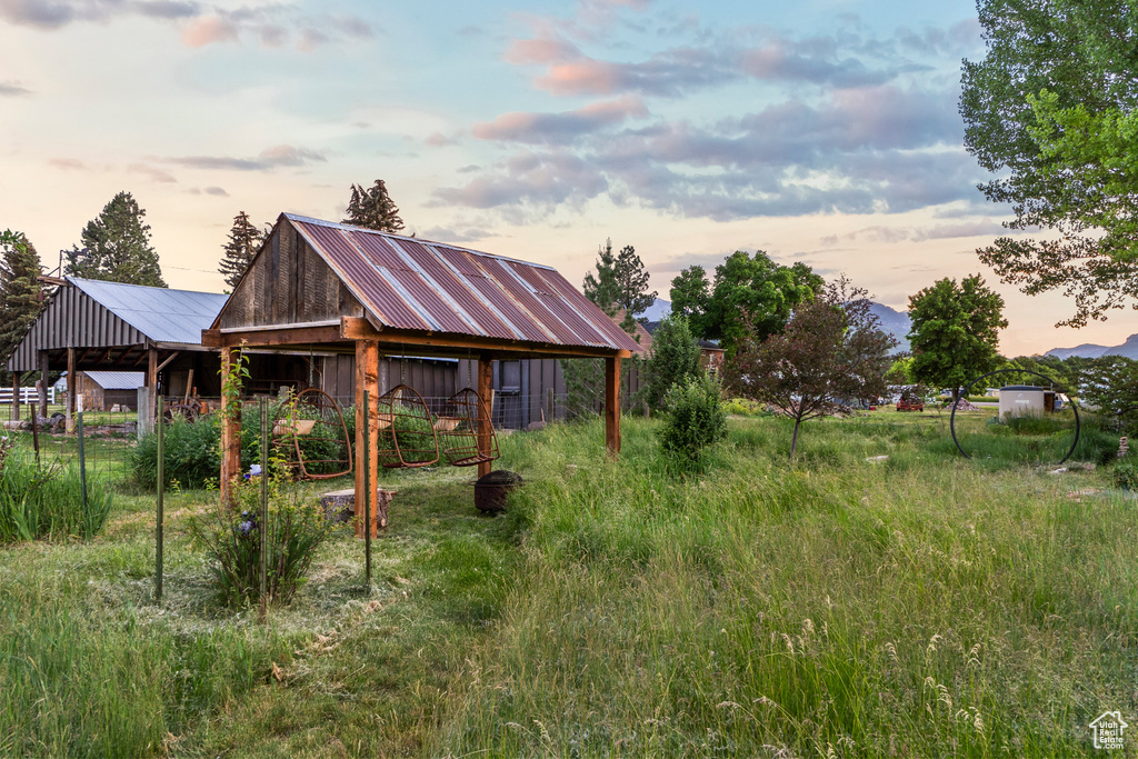 View of yard with an outbuilding