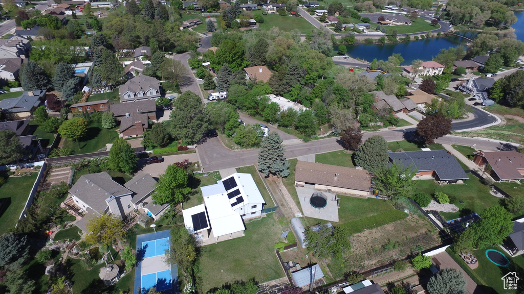 View of property location with nearby suburban area and a large body of water