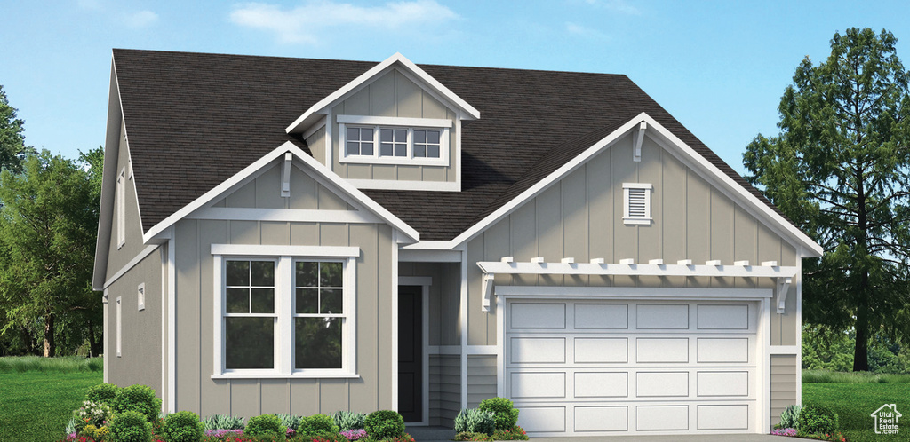 Modern farmhouse featuring board and batten siding, concrete driveway, roof with shingles, and an attached garage