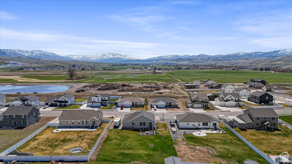 Aerial view of residential area with a water and mountain view