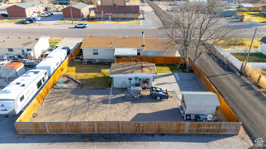 Birds eye view of property with a residential view