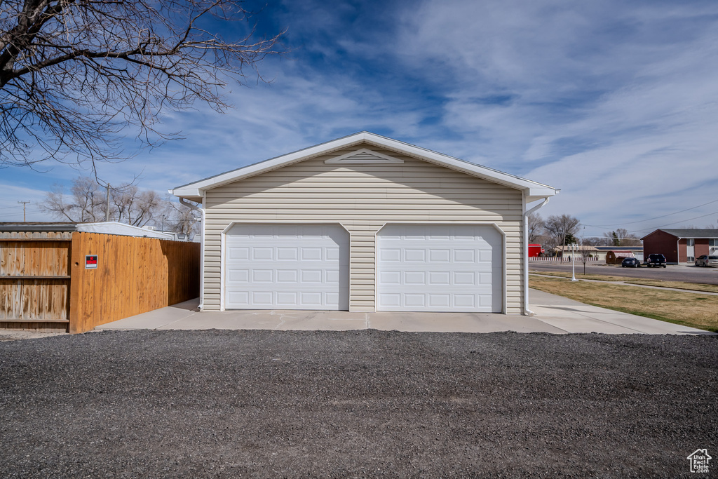 Detached garage with fence