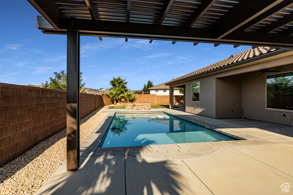 View of swimming pool featuring a patio, a fenced in pool, and a fenced backyard