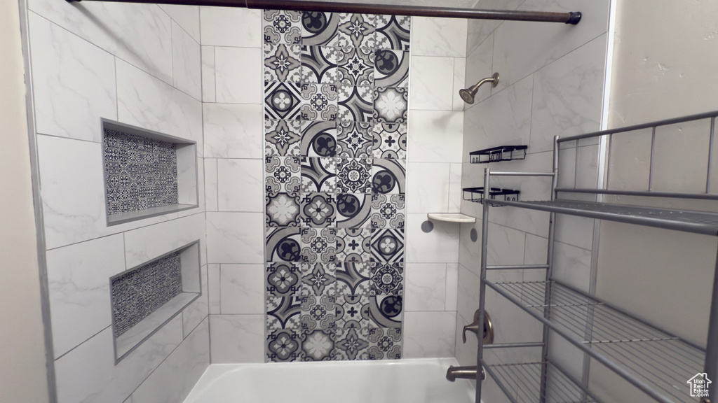 Bathroom featuring tub / shower combination