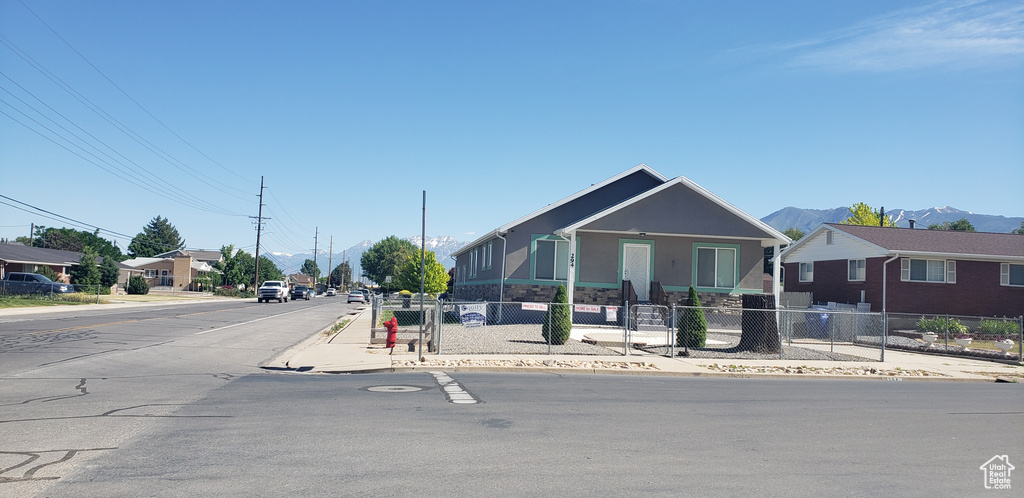 View of front of home featuring a mountain view