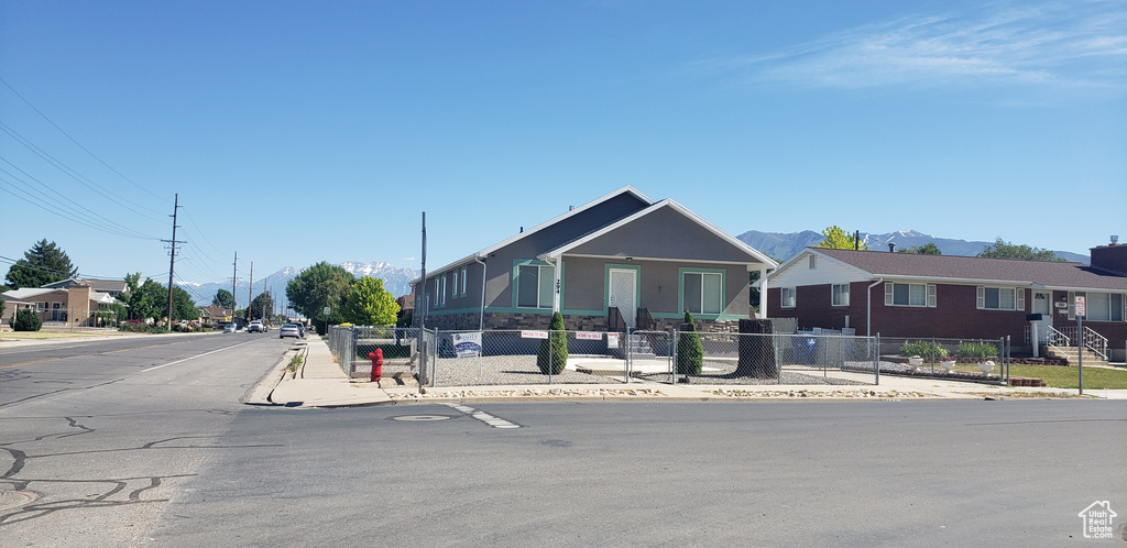 View of front of property with a mountain view