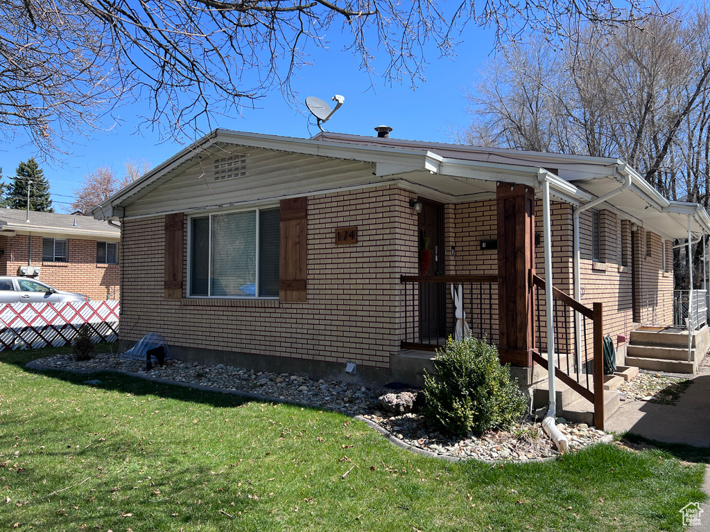 View of front of home with a front yard
