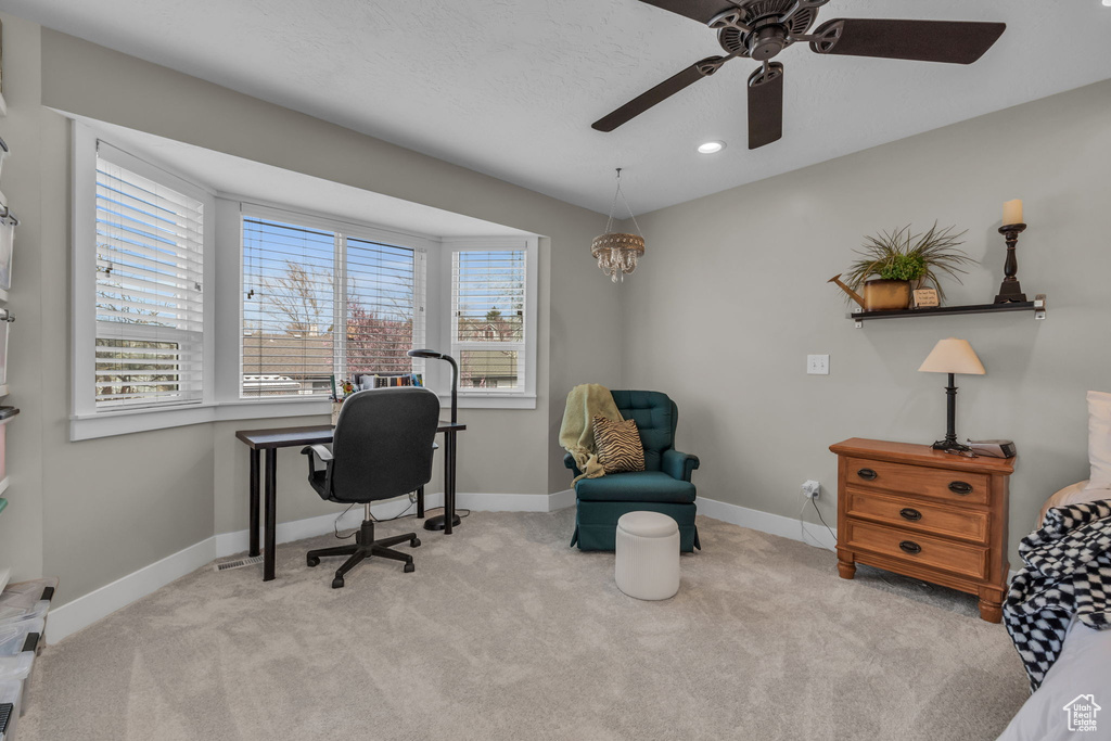Carpeted office space with baseboards, a ceiling fan, and recessed lighting