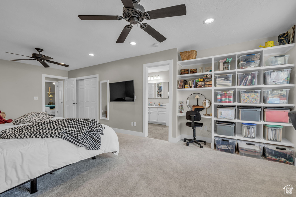 Bedroom with ceiling fan, ensuite bathroom, a closet, recessed lighting, and carpet floors
