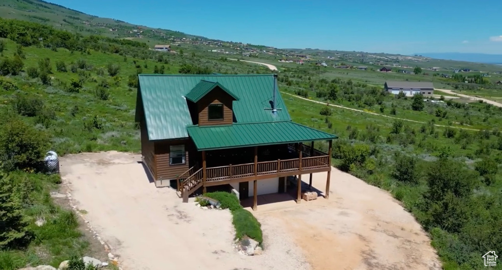 View of front of house featuring driveway