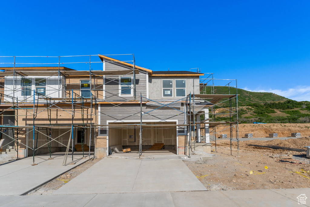 Unfinished property with a mountain view