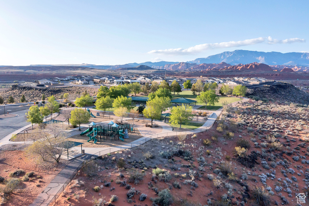 Birds eye view of property with a mountain view