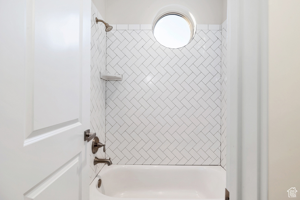Full bath featuring tub / shower combination