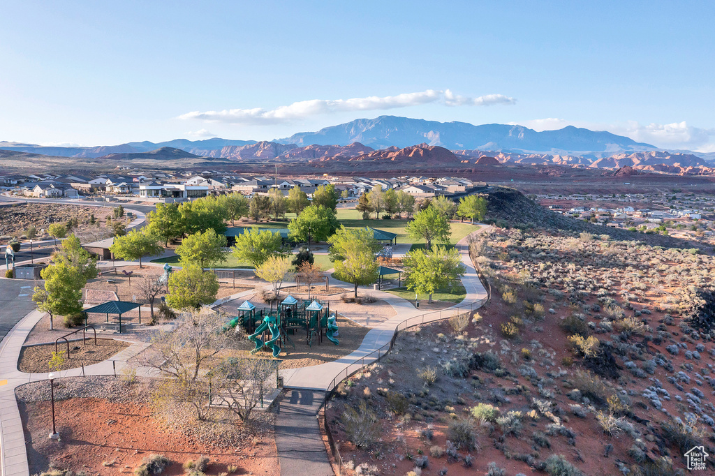 Birds eye view of property with a mountain view