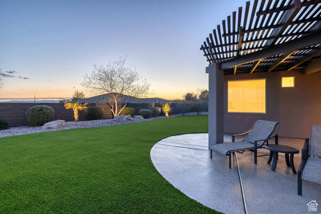 View of yard featuring a patio area and fence