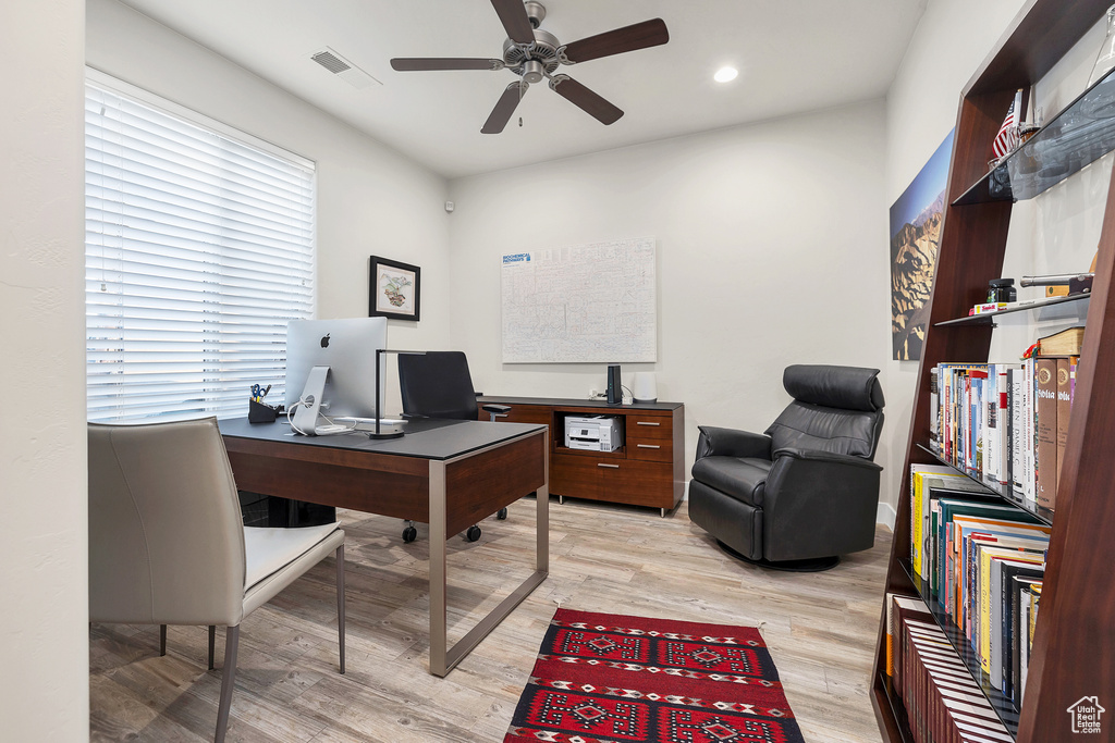 Office area with visible vents, a ceiling fan, recessed lighting, and light wood finished floors