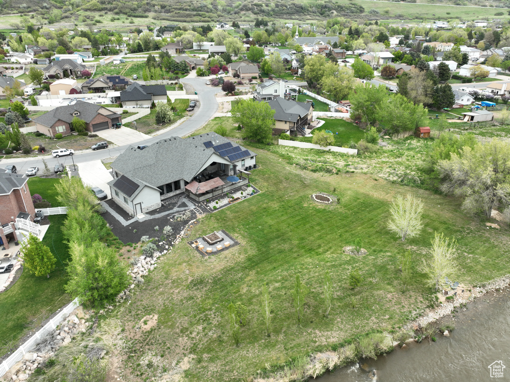 Aerial view with a residential view and a water view