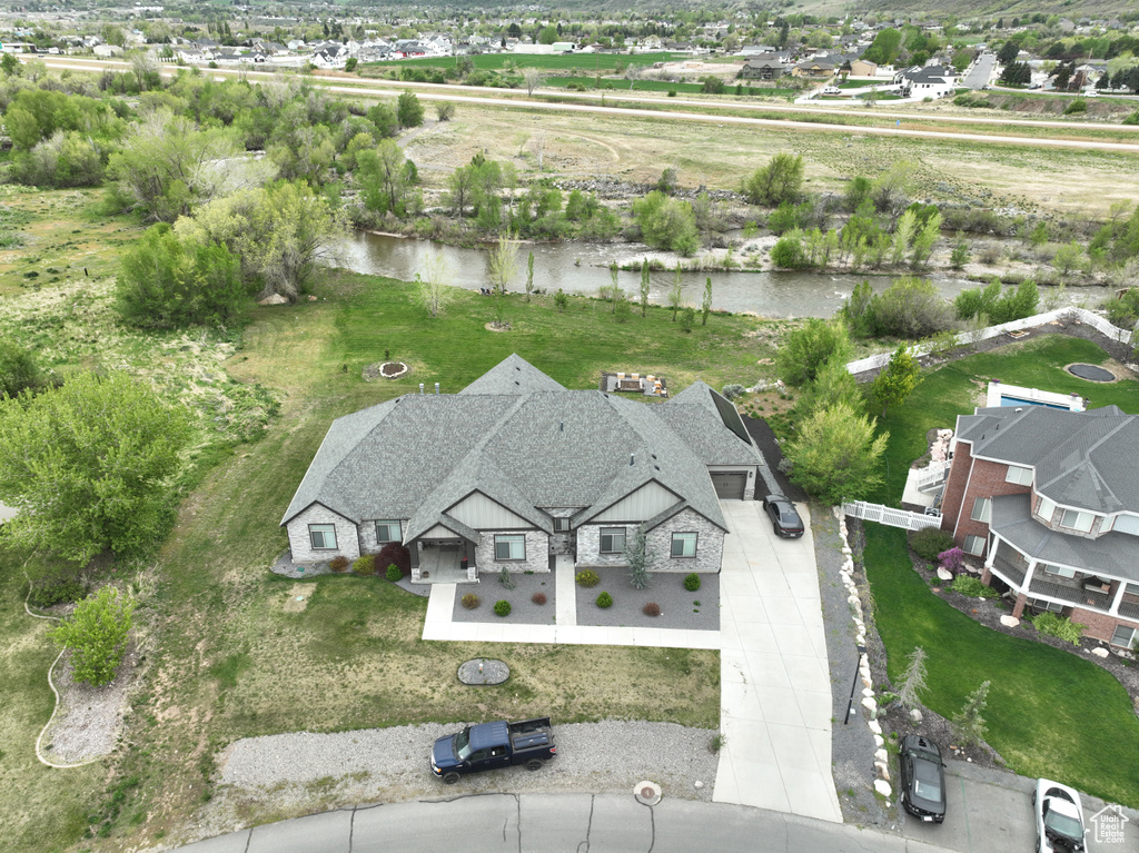 Aerial view featuring a water view