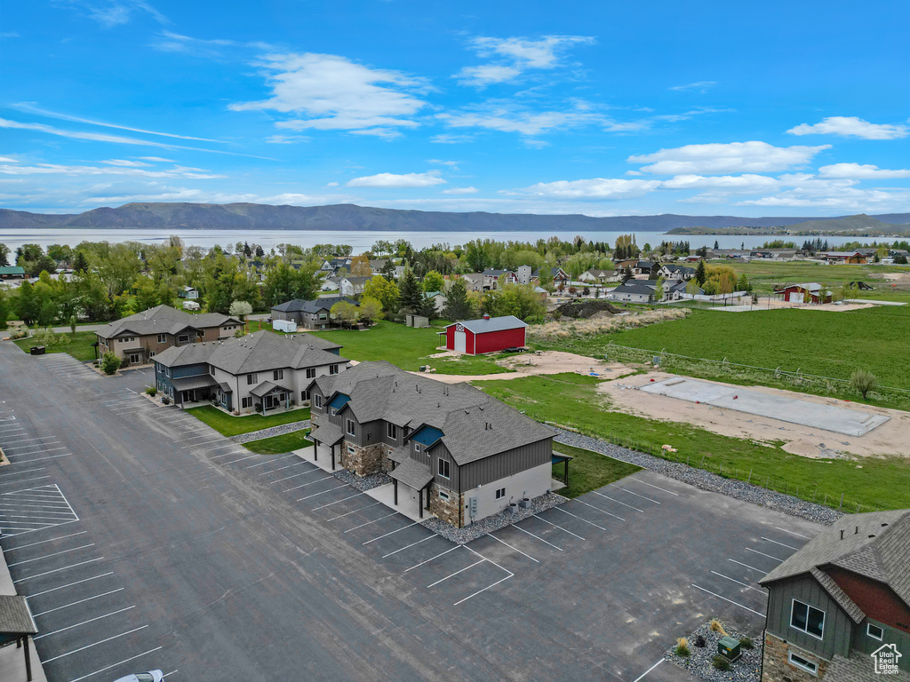 Aerial view of residential area with a water and mountain view
