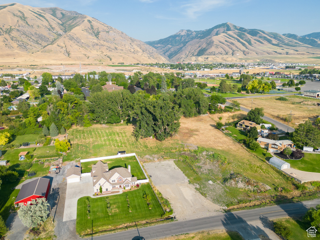 Birds eye view of property featuring a mountain view