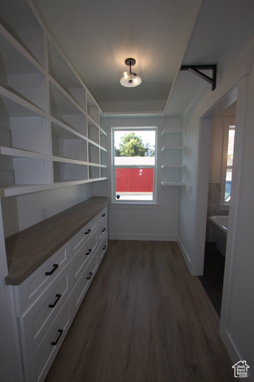 Interior space featuring dark wood-style floors