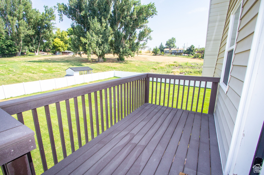 Wooden deck with a yard