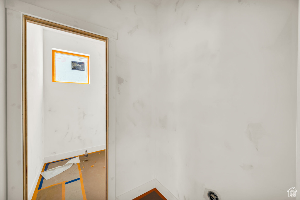 Laundry area with baseboards