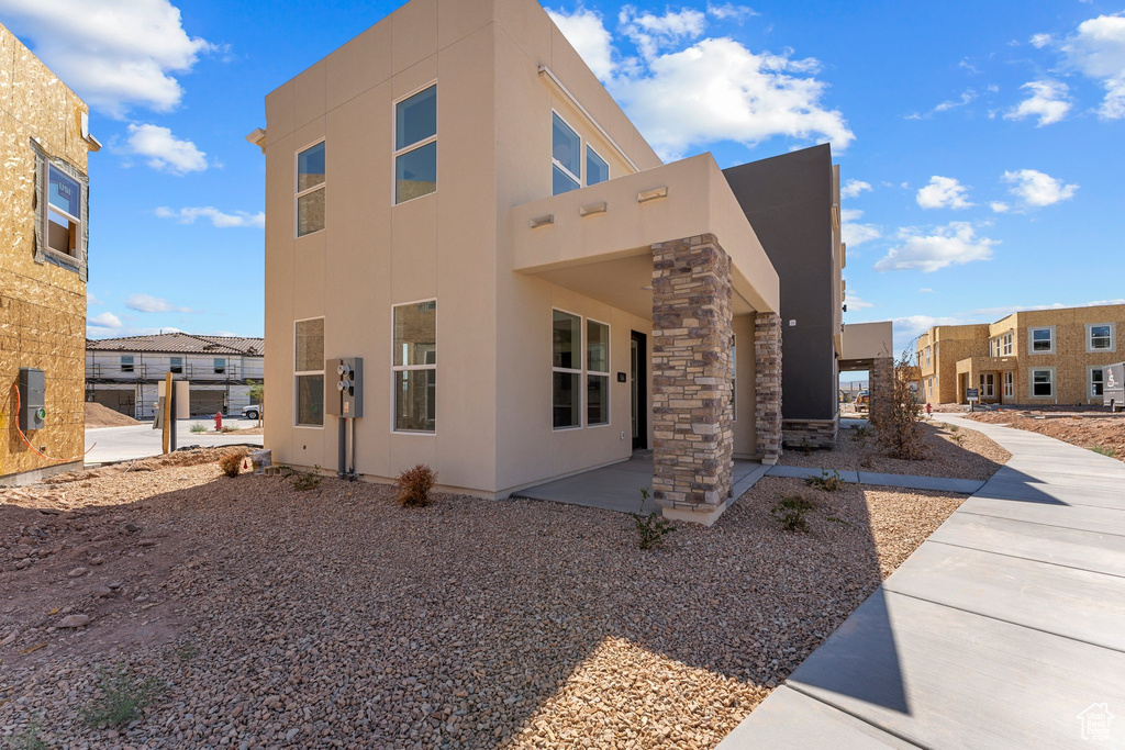 View of home's exterior featuring stucco siding