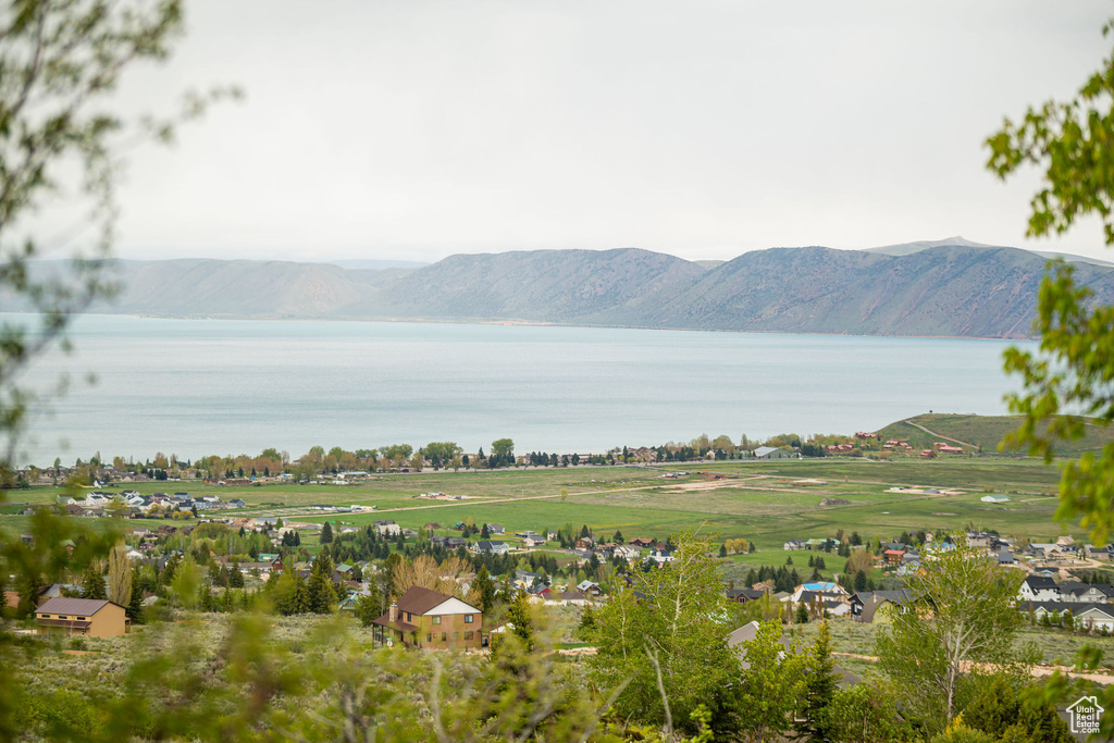Mountain view featuring a nearby body of water