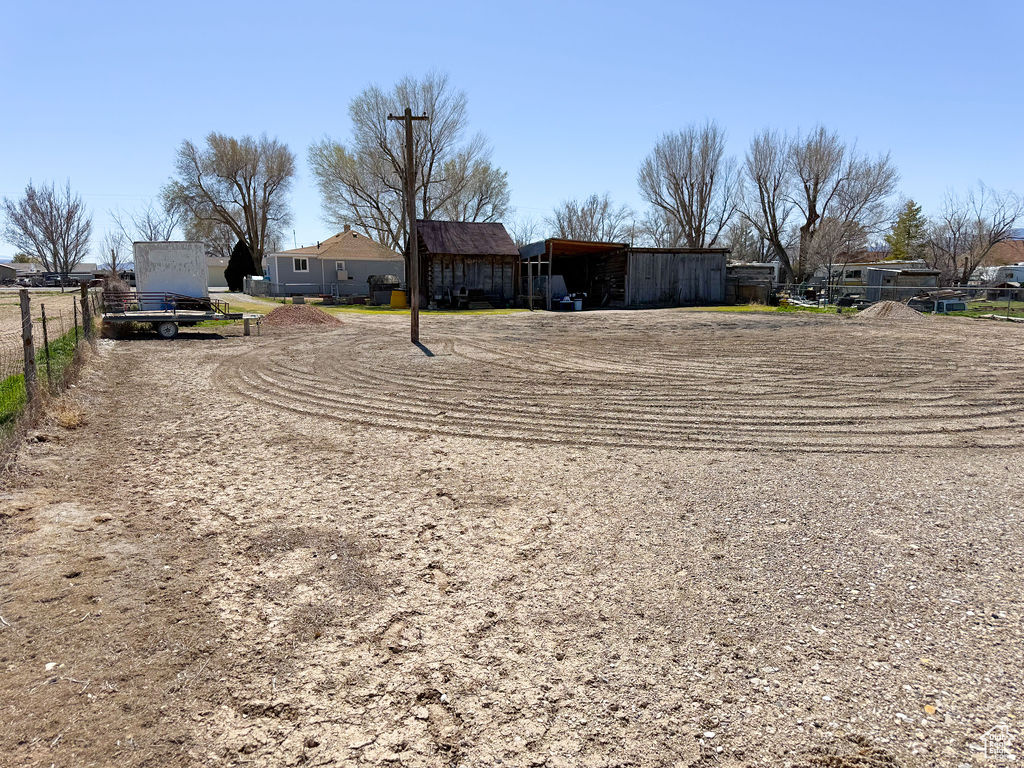 View of yard featuring fence