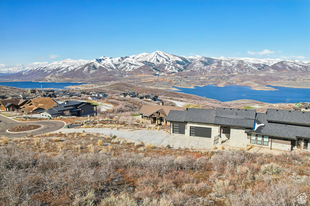 Mountain view featuring a water view