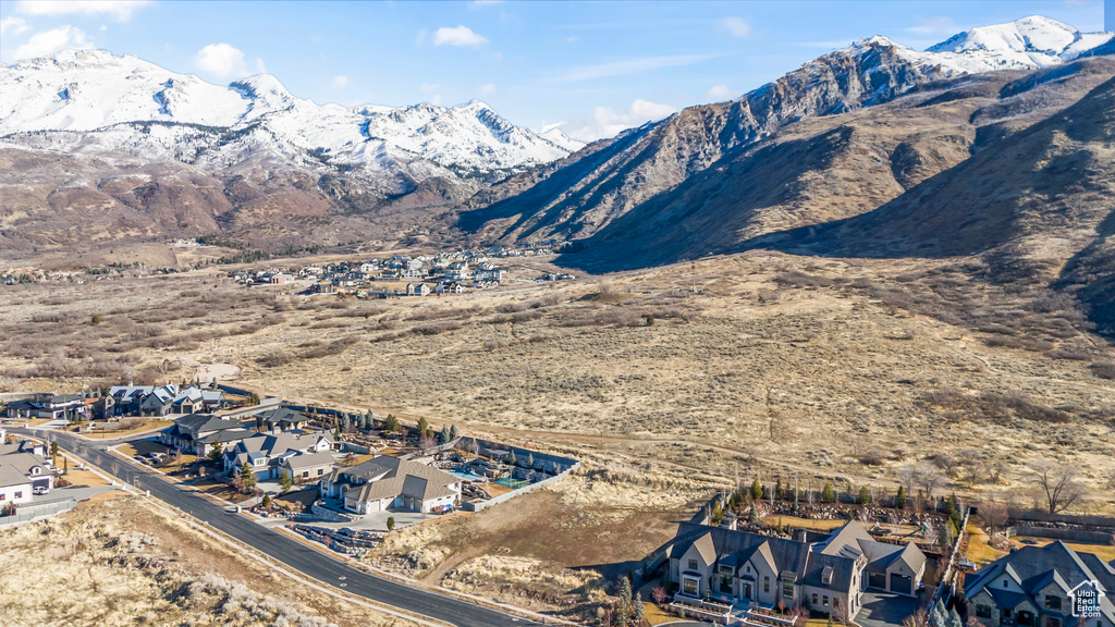 Property view of mountains featuring a residential view