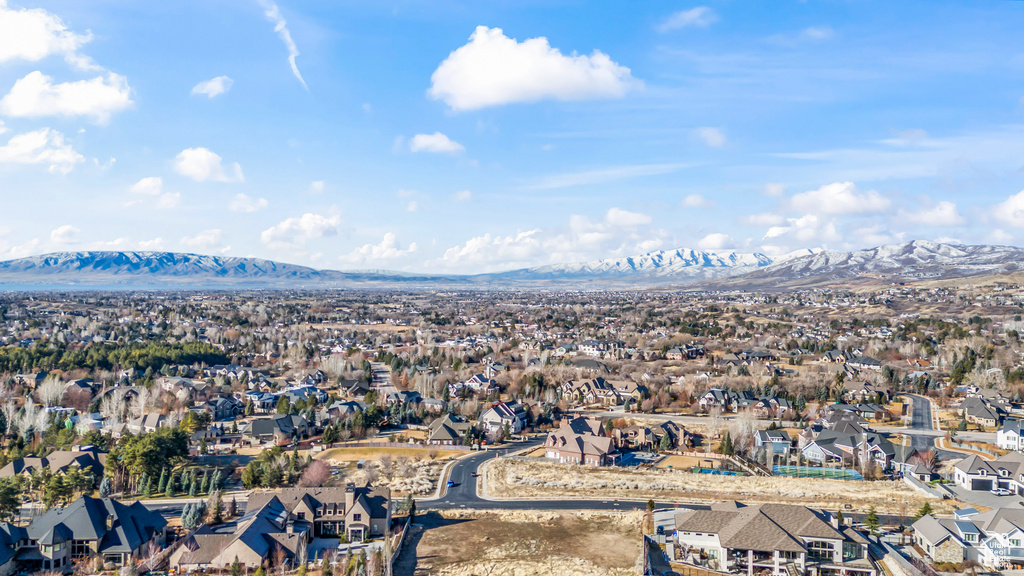 Aerial view featuring a mountain view and a residential view