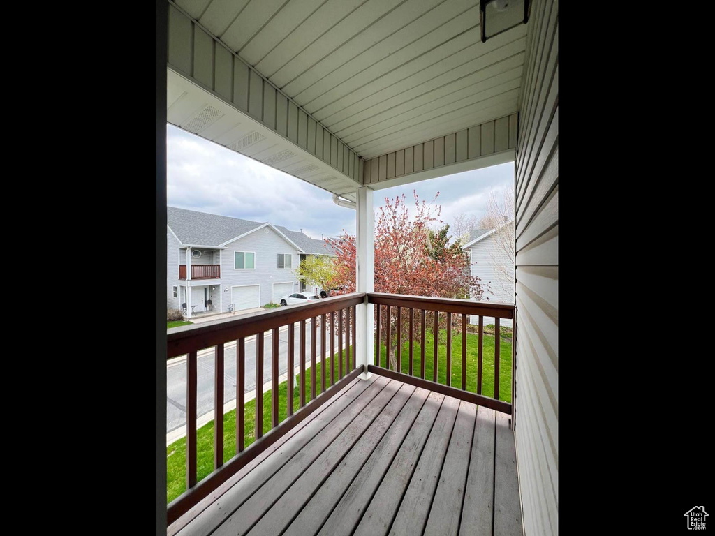 Wooden deck featuring a residential view