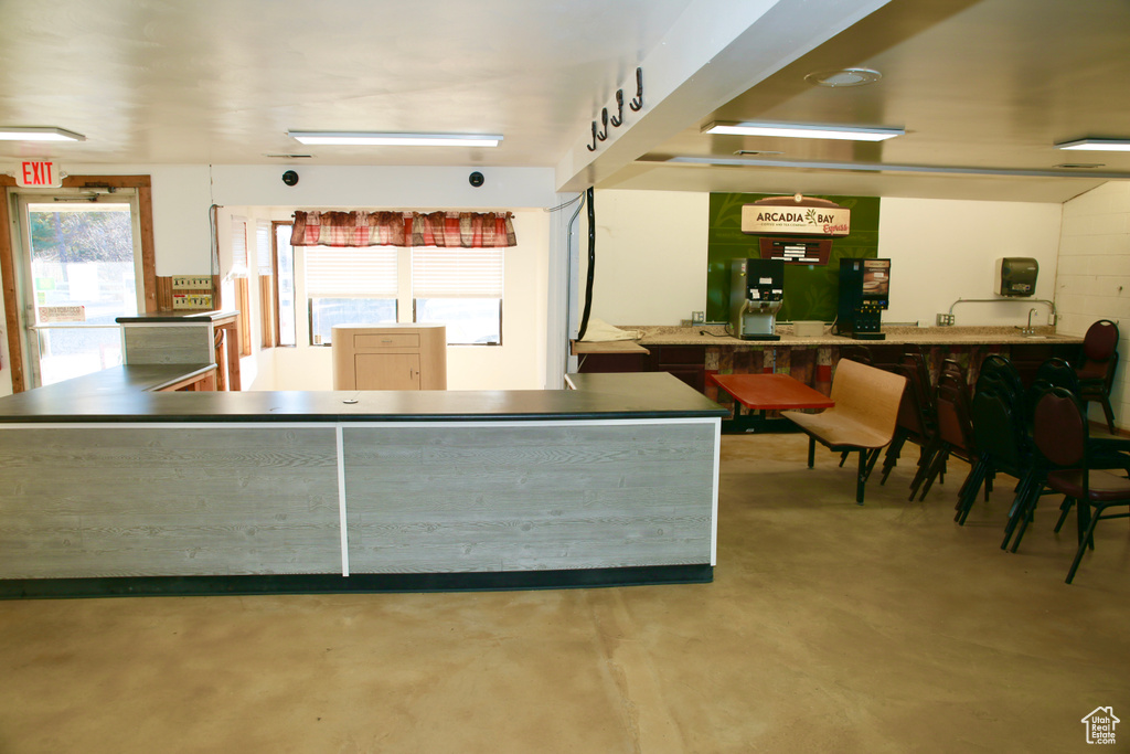 Kitchen featuring concrete floors