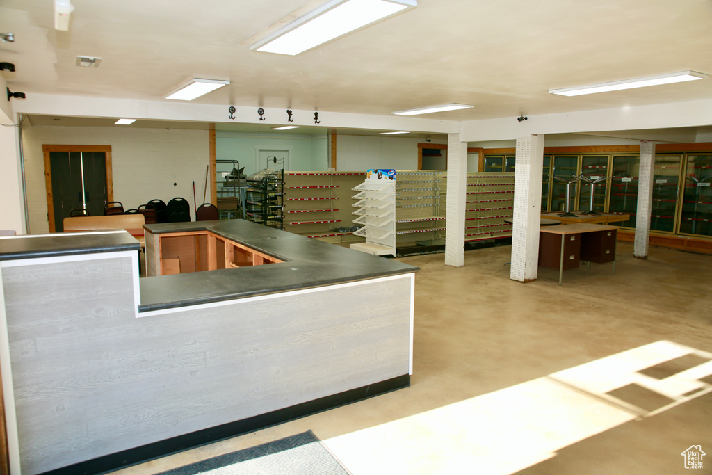 Kitchen with concrete floors and visible vents