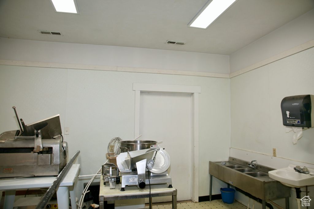 Misc room featuring a sink and visible vents