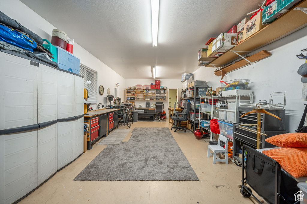 Garage featuring a workshop area