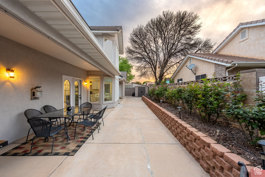 View of patio / terrace featuring french doors, a fenced backyard, and outdoor dining space