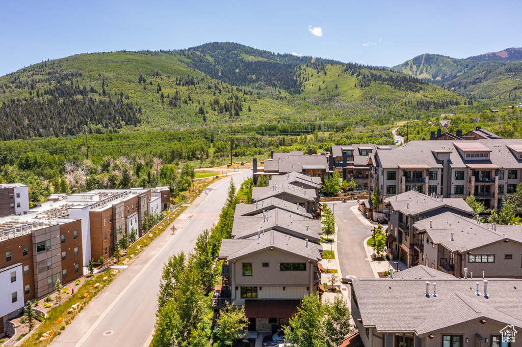 Aerial view of residential area featuring mountains