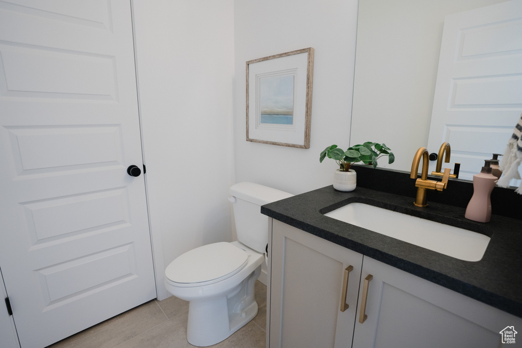 Bathroom with toilet and vanity