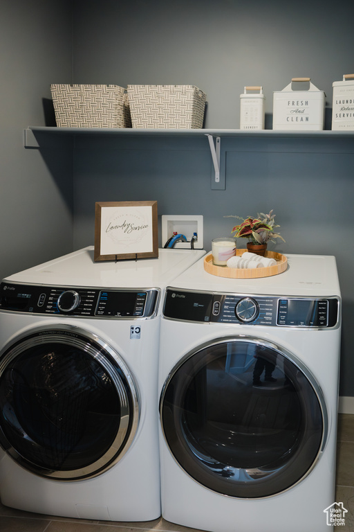 Laundry room featuring washing machine and dryer and laundry area