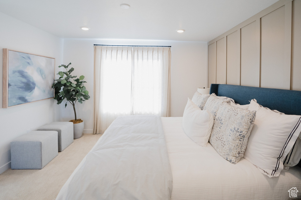Carpeted bedroom featuring recessed lighting