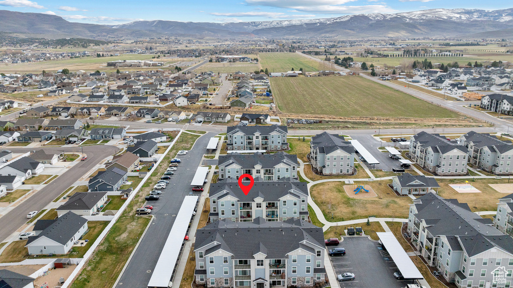 Aerial view featuring a mountain view and a residential view
