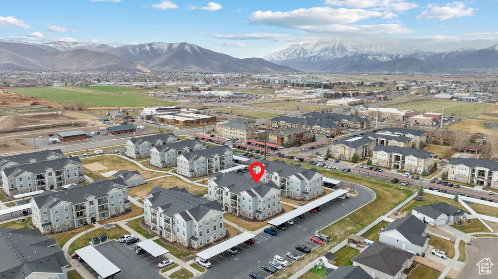 Birds eye view of property with a mountain view