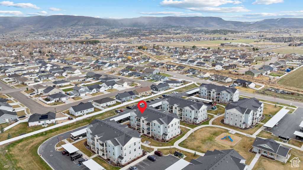 Aerial view featuring a mountain view and a residential view
