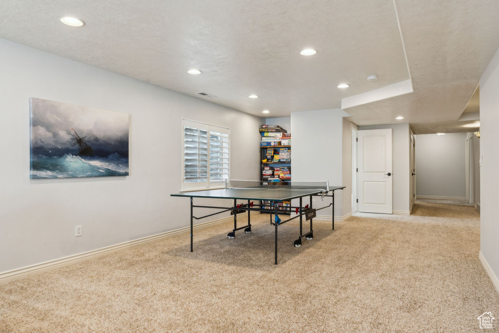 Recreation room with visible vents, baseboards, recessed lighting, and carpet