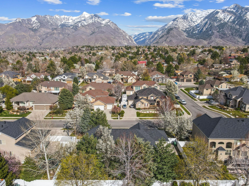 Drone / aerial view featuring a mountain view and a residential view