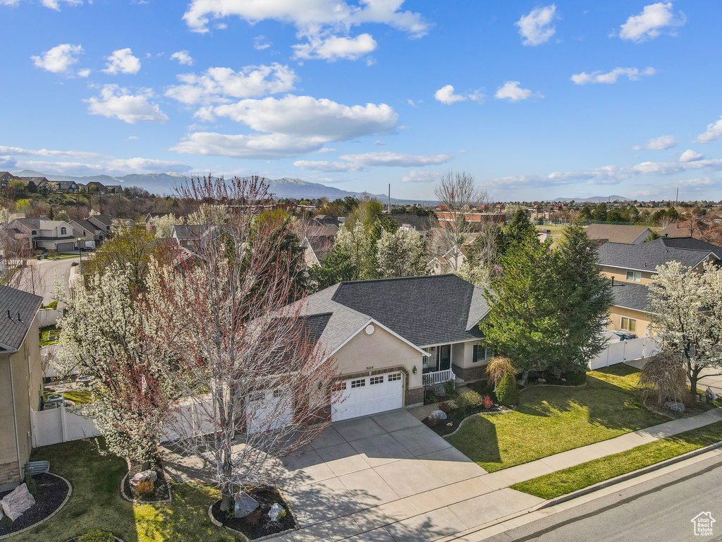 Drone / aerial view with a mountain view and a residential view