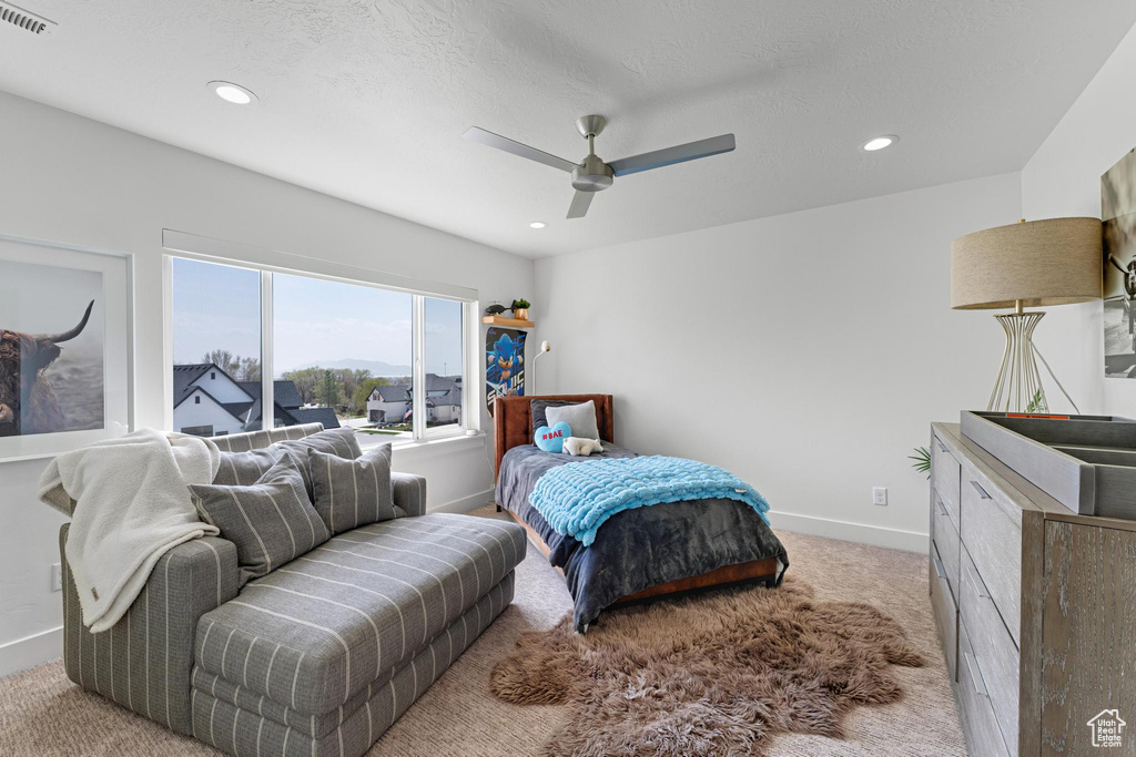 Carpeted bedroom featuring baseboards, a ceiling fan, visible vents, and recessed lighting